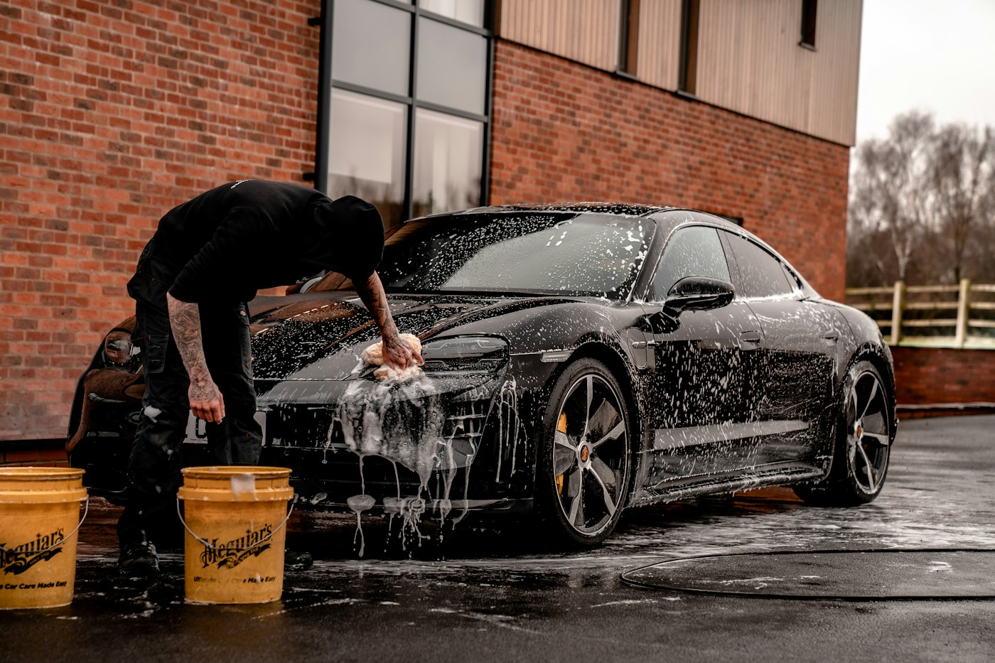 Close-up of exterior car cleaning