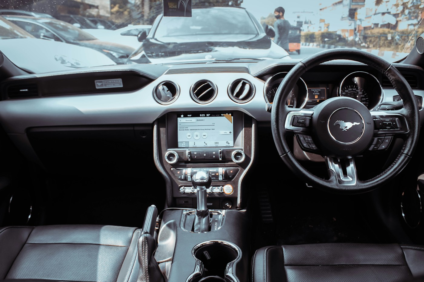 The dashboard and steering wheel inside a car